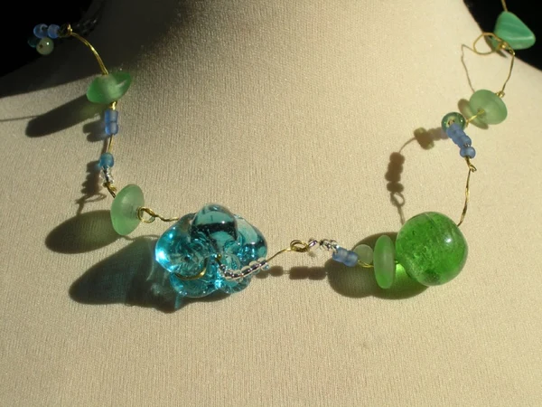 Messing groen en blauw glas